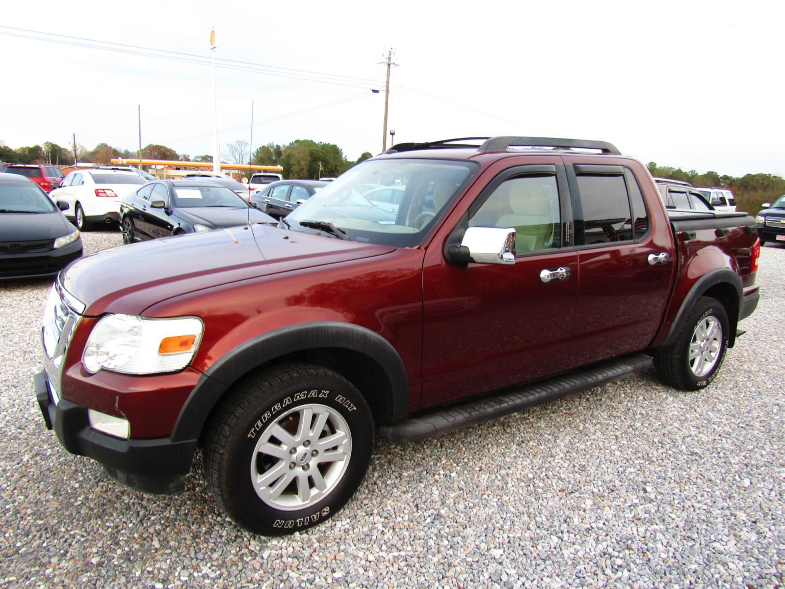 2010 Bronze /Tan Ford Explorer Sport Trac XLT 4.0L 2WD (1FMEU3BE3AU) with an 4.0L V6 SOHC 12V engine, Automatic transmission, located at 15016 S Hwy 231, Midland City, AL, 36350, (334) 983-3001, 31.306210, -85.495277 - Photo #2